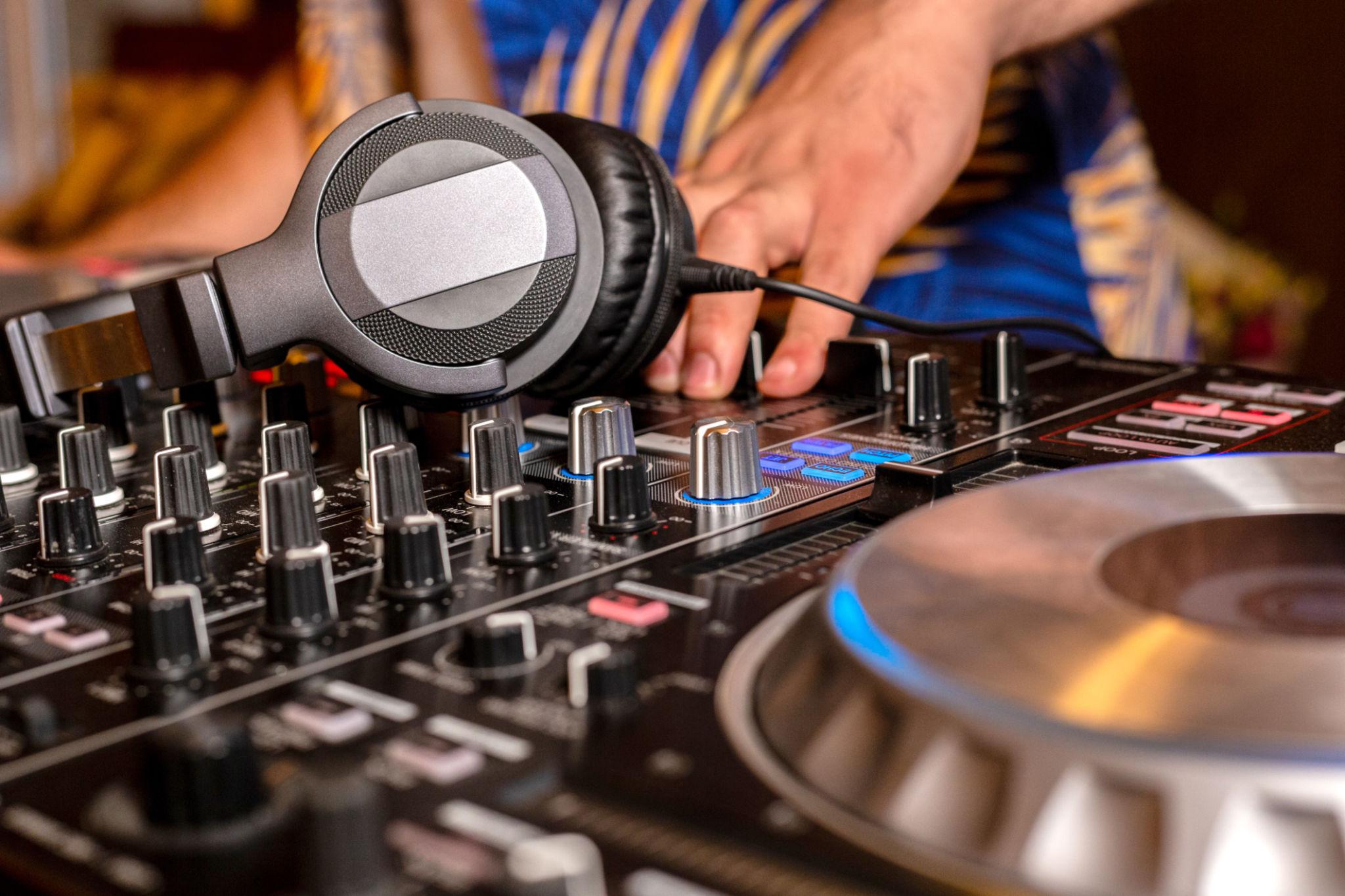 DJ equipment and music practice setup for learning track selection and mixing